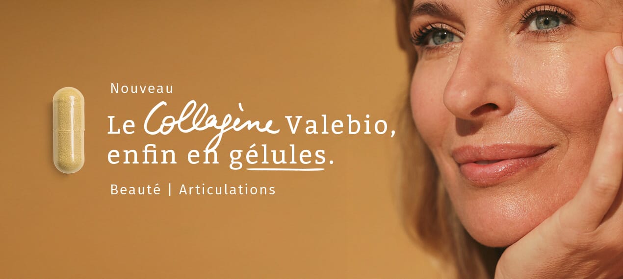 Jeune femme avec une gélule dans la main